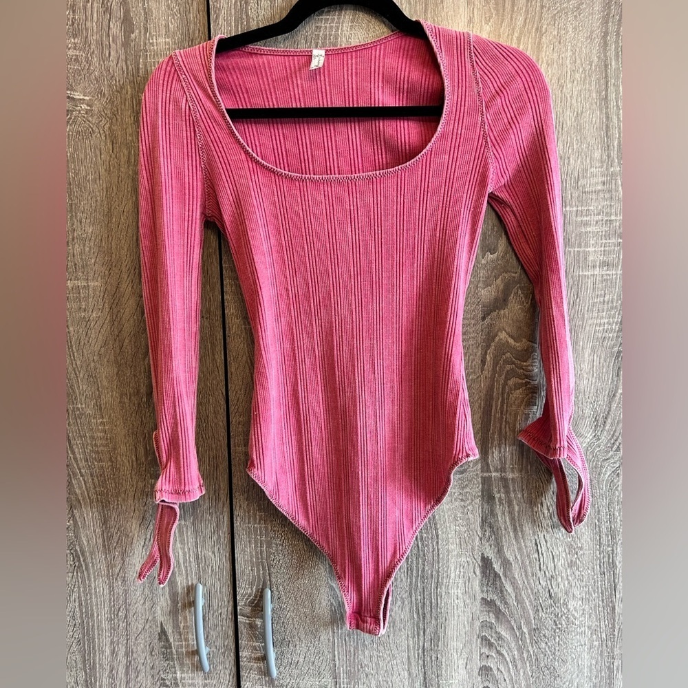 FREE PEOPLE Wine Colored Ribbed Long sleeve Bodysuit. Size XS